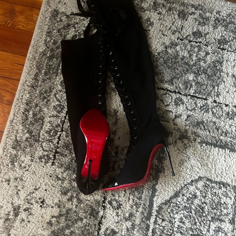 Christian Louboutin thigh high lace up boots